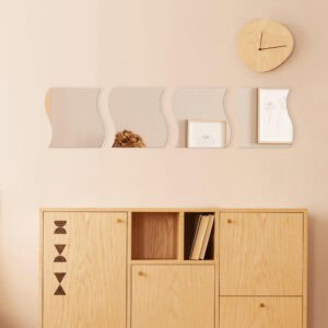 "Four wave-shaped mirrors in a horizontal row above a wooden sideboard in a living room"