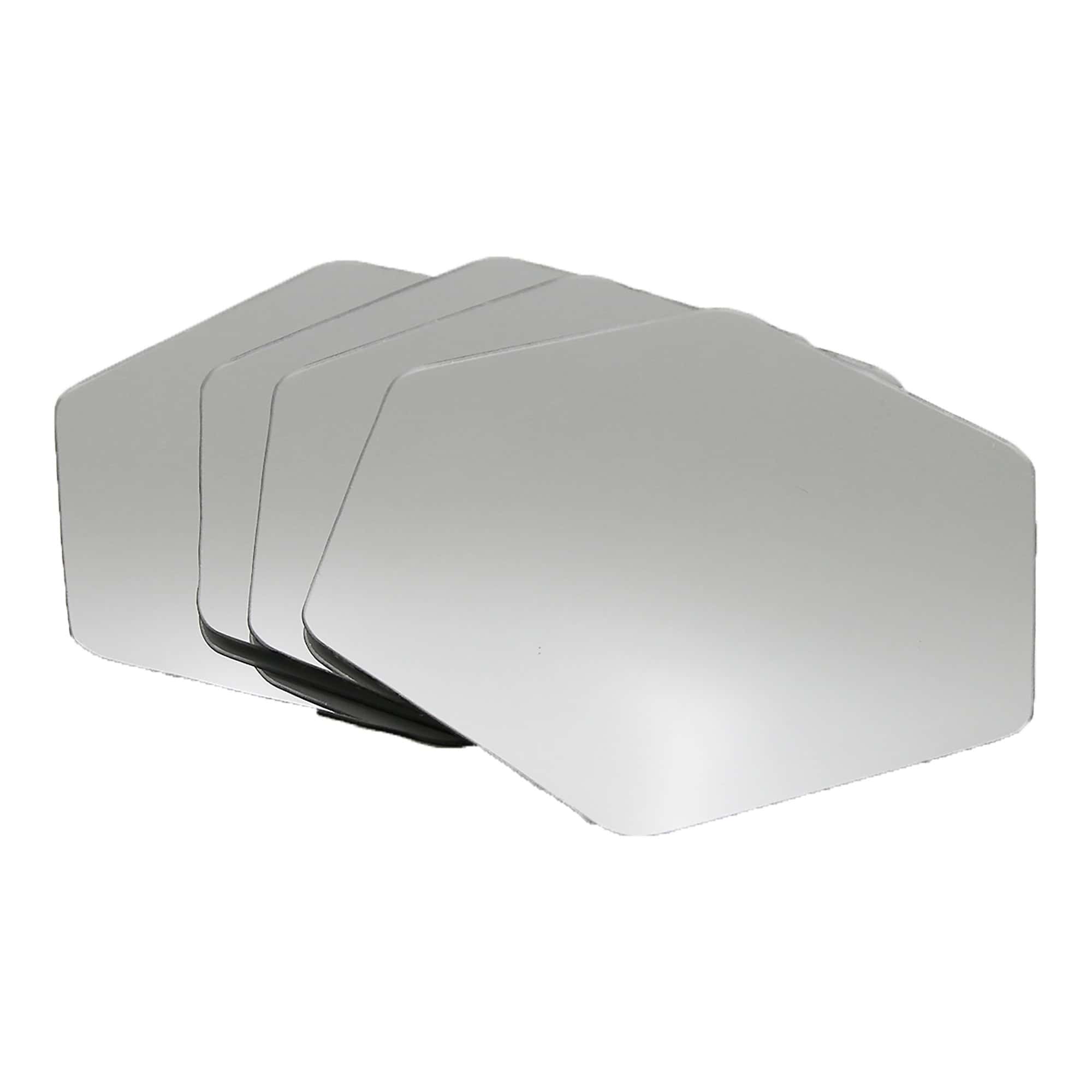 "Four hexagonal frameless mirrors stacked and fanned out, product shot on white background"