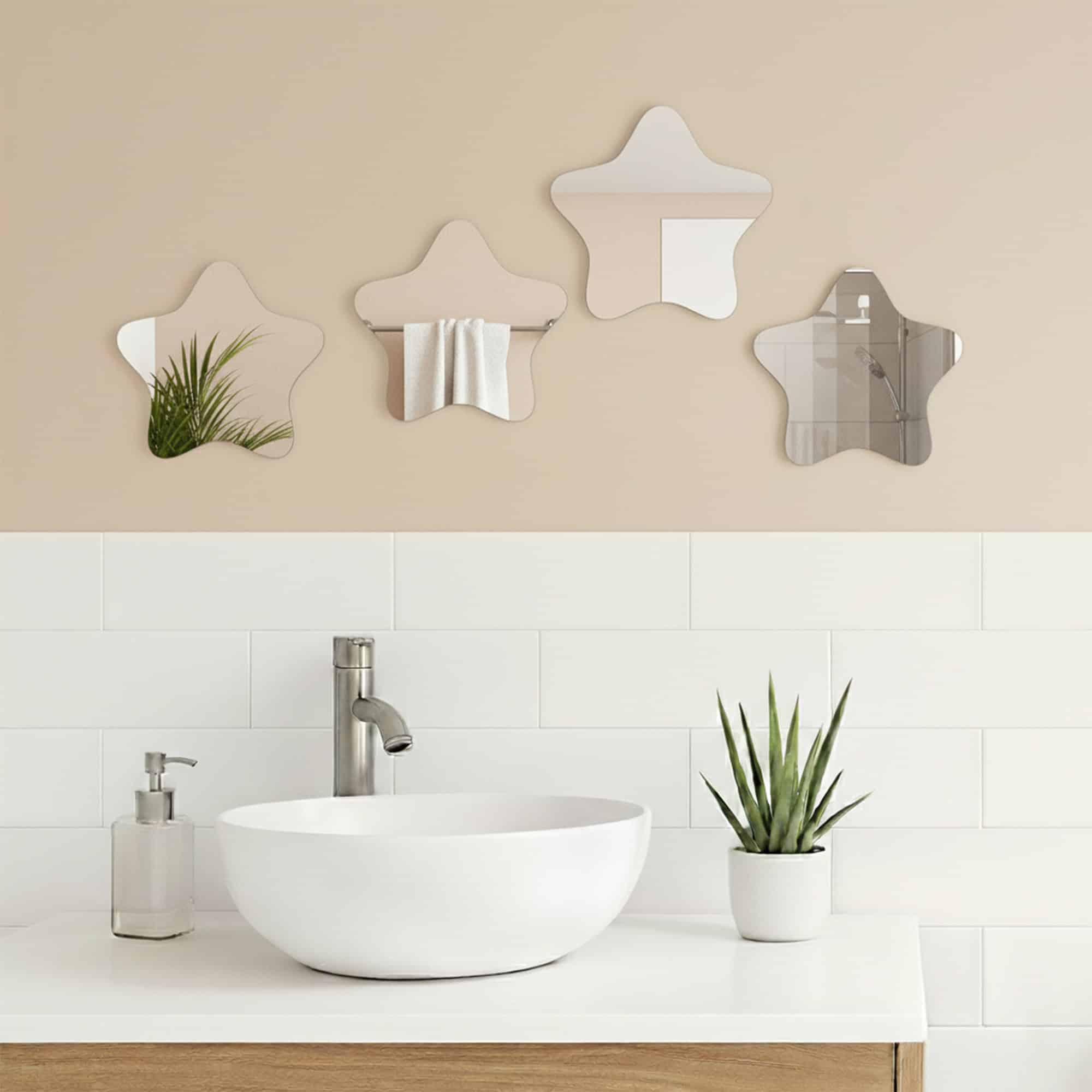 "Four rounded star-shaped mirrors in horizontal row above a white vessel sink in a modern bathroom"