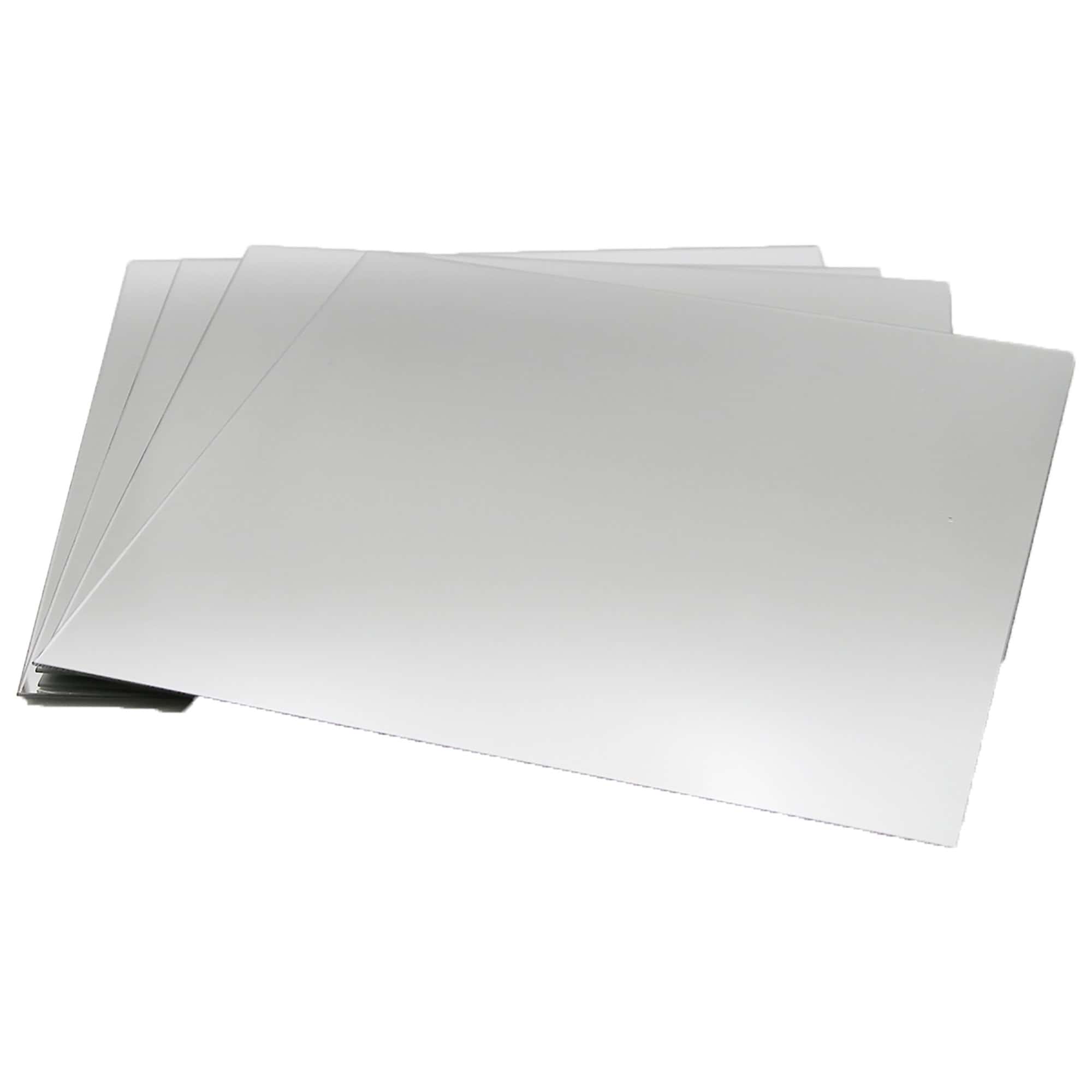 "Four large square frameless mirrors stacked and fanned out, product shot on white background"