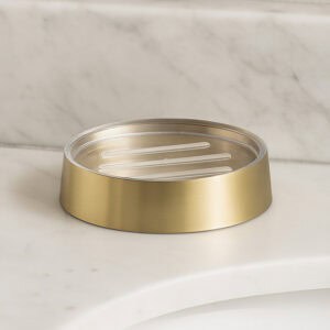 Empty brushed gold soap dish showing clear insert