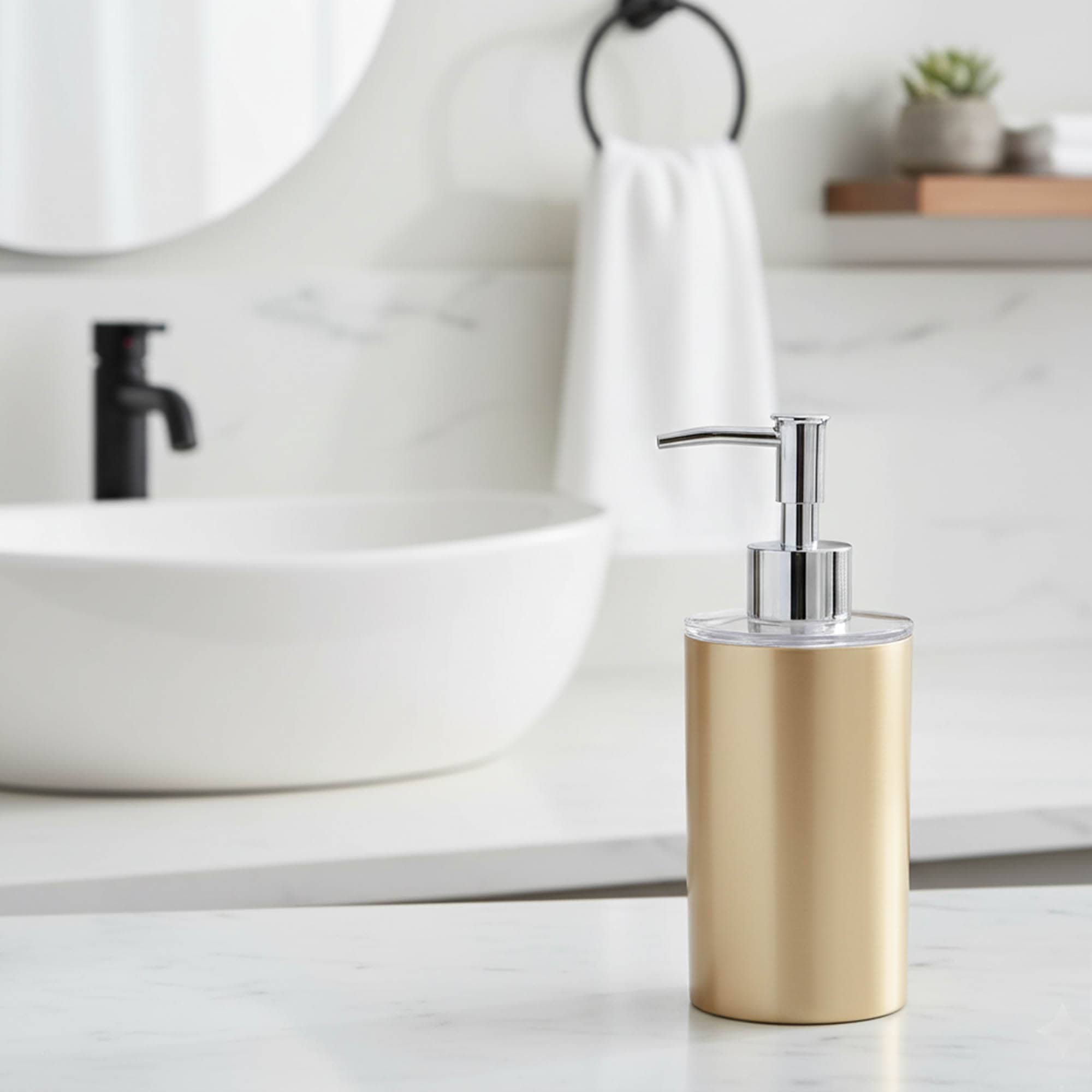 “Brushed gold soap dispenser on marble bathroom counter”
