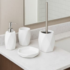 White diamond-shaped bathroom accessory set including soap dispenser, tumbler, toilet brush, and soap dish on vanity