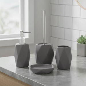Matte gray 4-piece bathroom accessory set on countertop with pump, tumbler, soap dish, and toilet brush