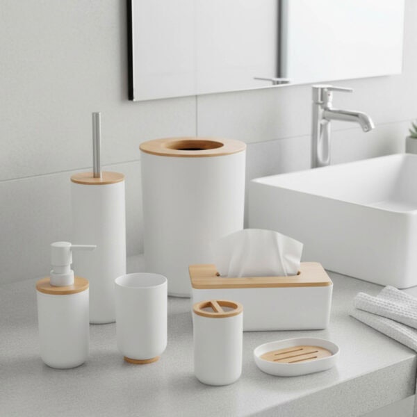 White 7-piece bathroom accessory set with bamboo accents displayed on countertop
