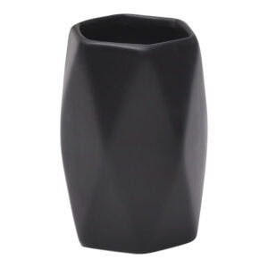 Matte black faceted bathroom tumbler cup on white background