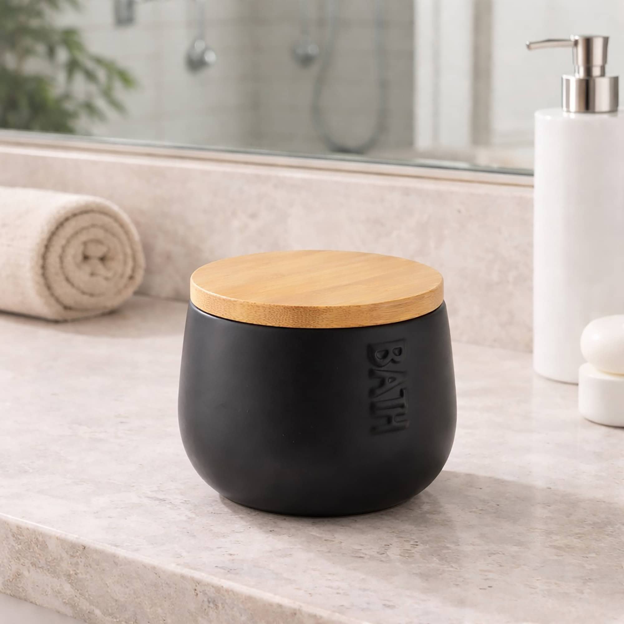 Black cotton box with bamboo lid on bathroom counter