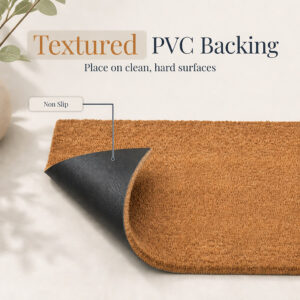 Coco coir rug corner flipped to show textured non-slip PVC backing