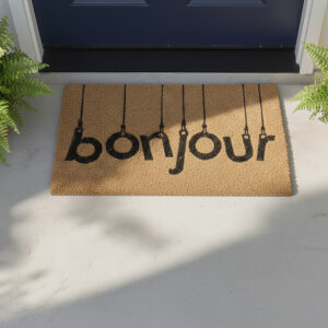 Natural coir doormat with “bonjour” text placed in front of a blue entry door