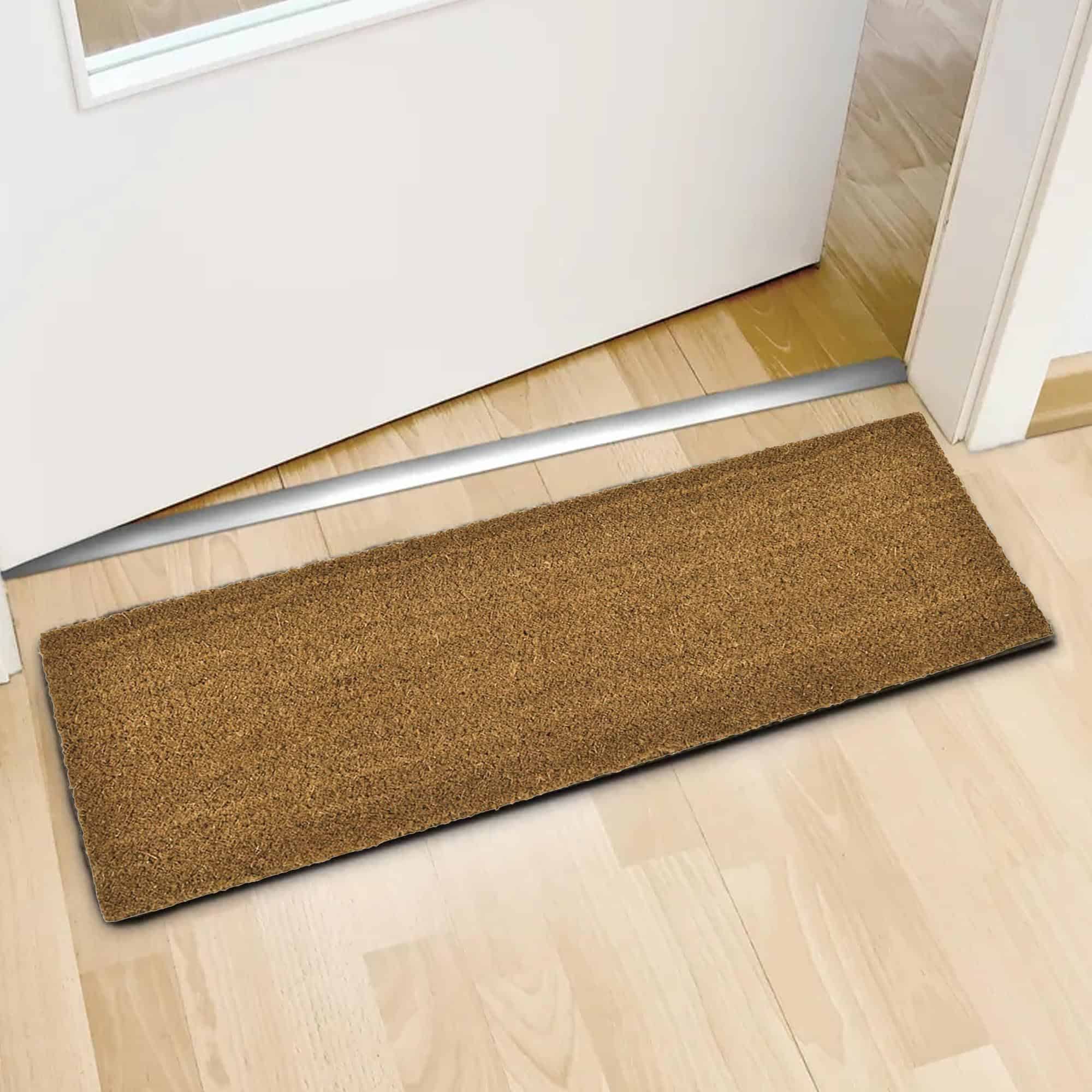 long coco mat on the floor in front of inside door