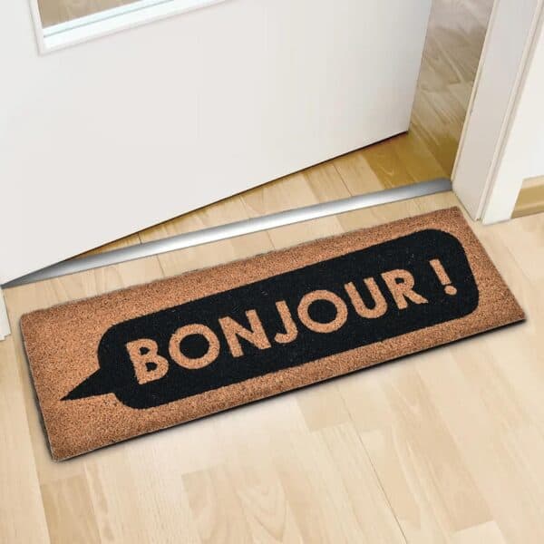 long coco mat on the floor in front of inside door