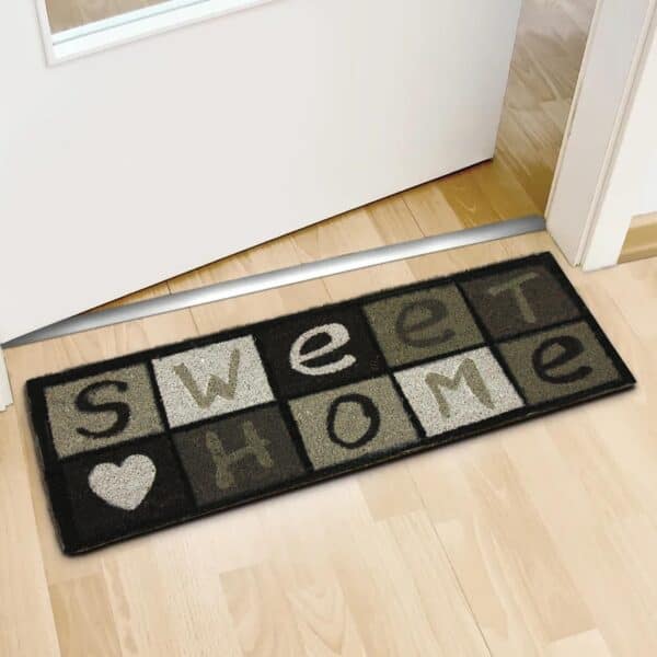 long coco mat on the floor in front of inside door