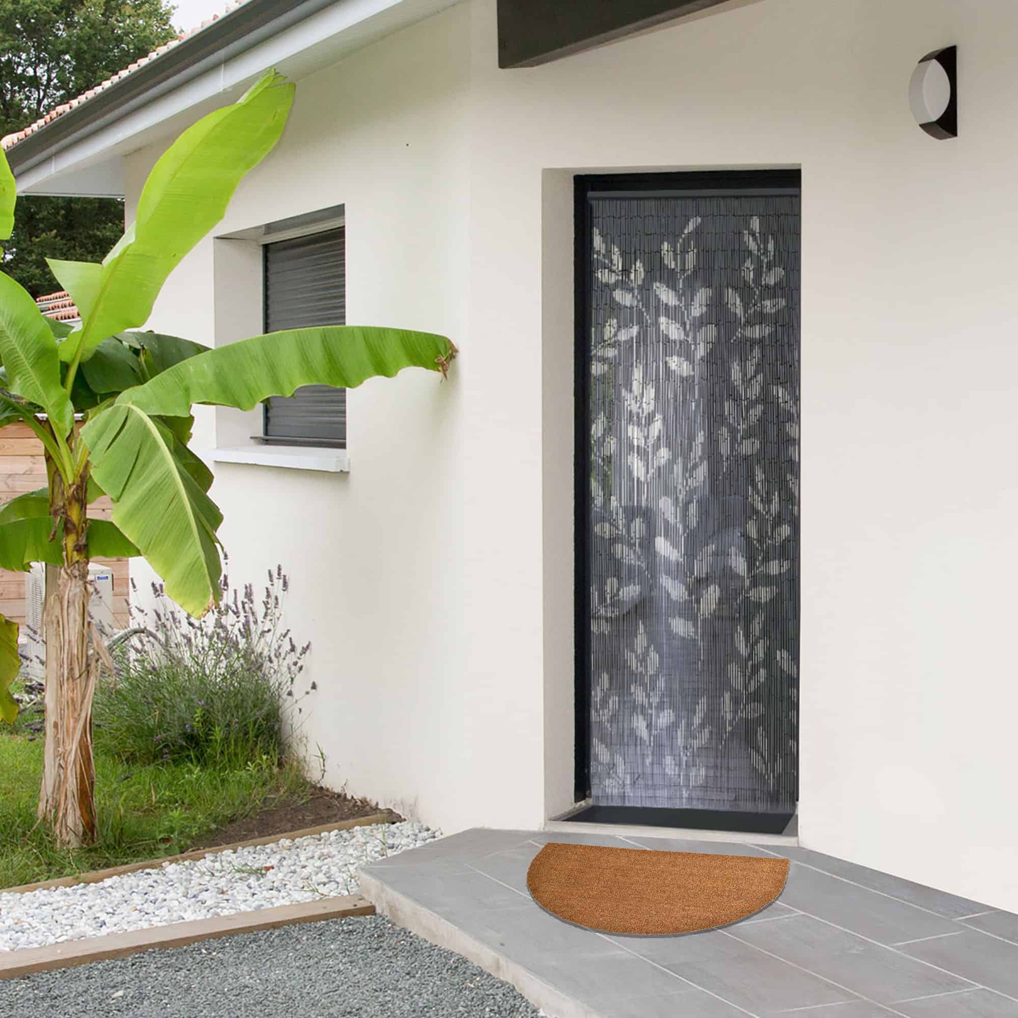 picture of outside entrance door with doormat on the floor