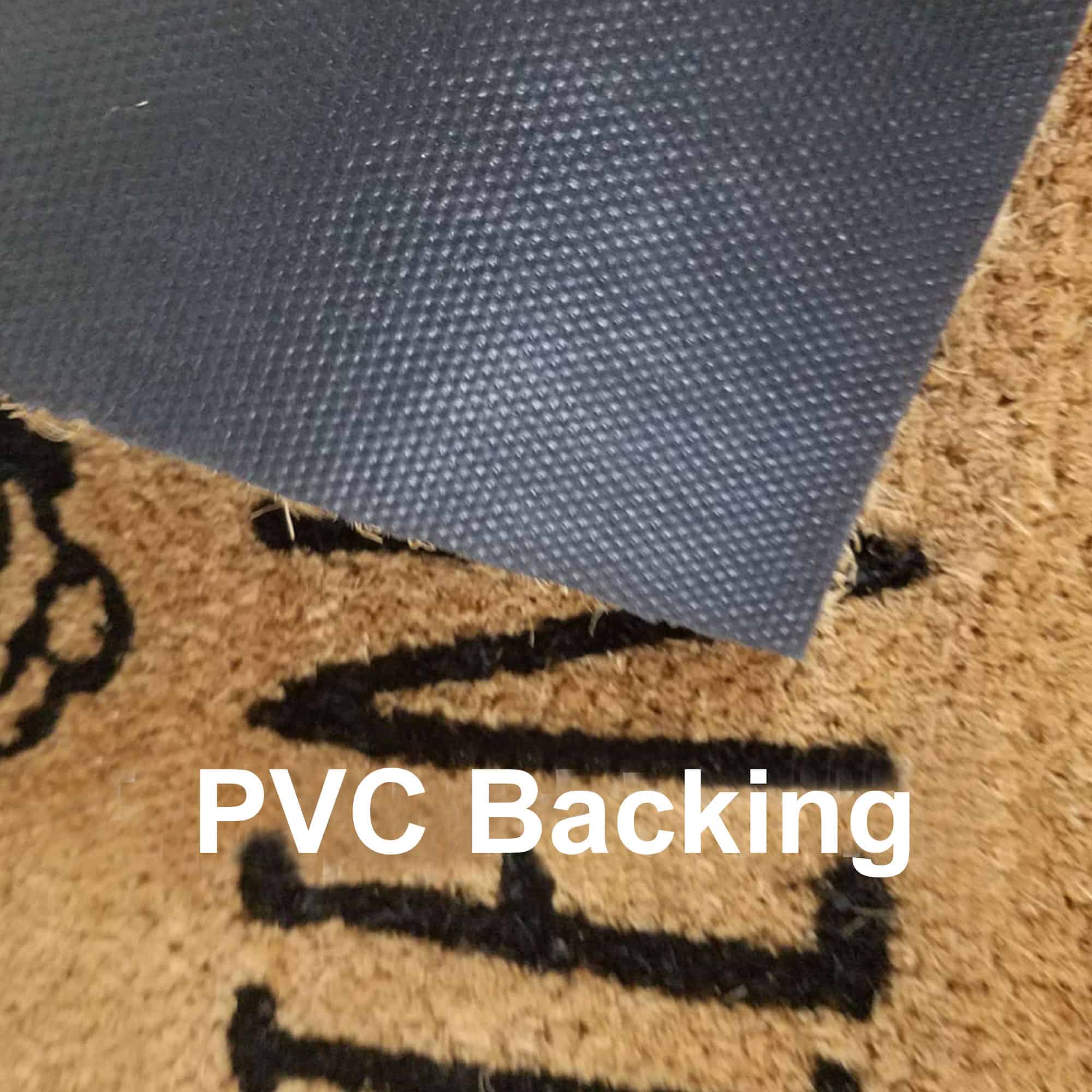 Close-up of Bienvenue doormat showing textured PVC backing