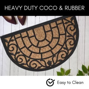 Heavy-duty half-round doormat made of coir and rubber on white floor