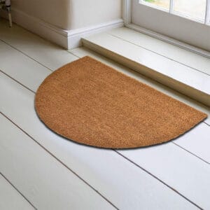 picture of inside entrance door with printed mat on the floor