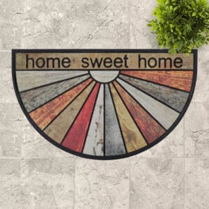 144131040-Stylish Home Sweet Home Mat Displayed Outdoors: The vibrant "Home Sweet Home" doormat featured at the entrance of an outdoor patio.