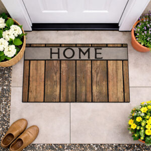 Top view of HOME welcome mat with plants at entrance