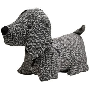 Charcoal weighted dog door stopper, black and white herringbone tweed, standing long-body dog shape with long floppy ears, embroidered black eyes, black nose, ribbon collar bow, and upright tail. White background.