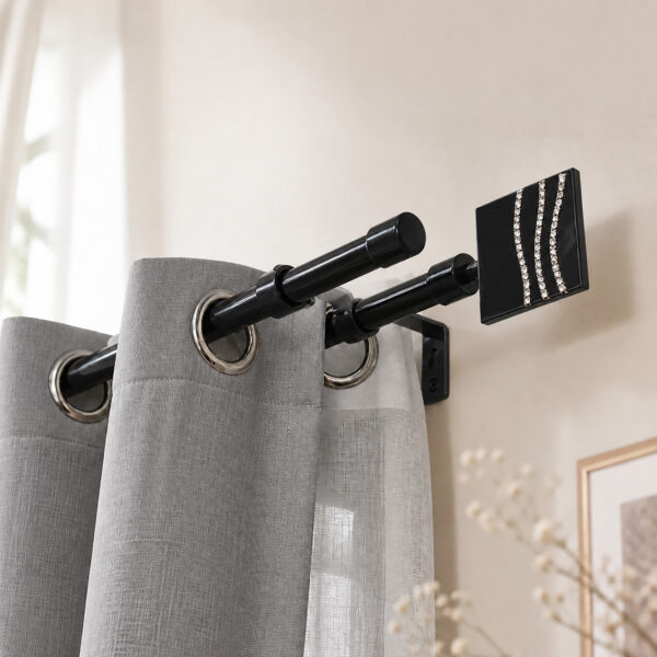 Black double curtain rod mounted above a window, grey drape on the front rod and sheer panel on the back rod