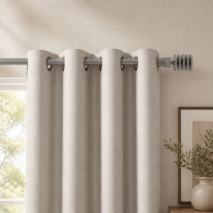 Taupe 1 inch curtain rod from the 2 pack above a living room window with ivory grommet curtains