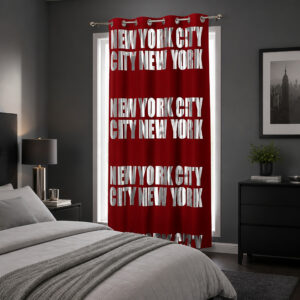 Red and silver NYC typography blackout curtain hanging on a bedroom window beside a bed