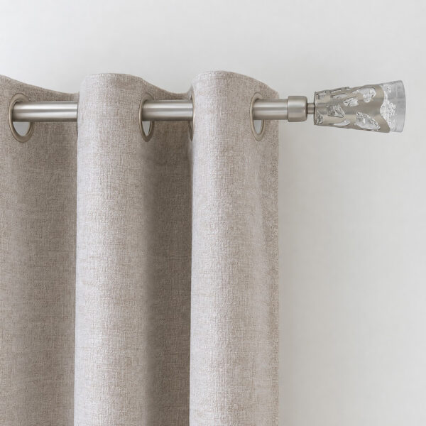 Silver 3/4 inch curtain rod with frosted leaf finial holding grommet curtain panels