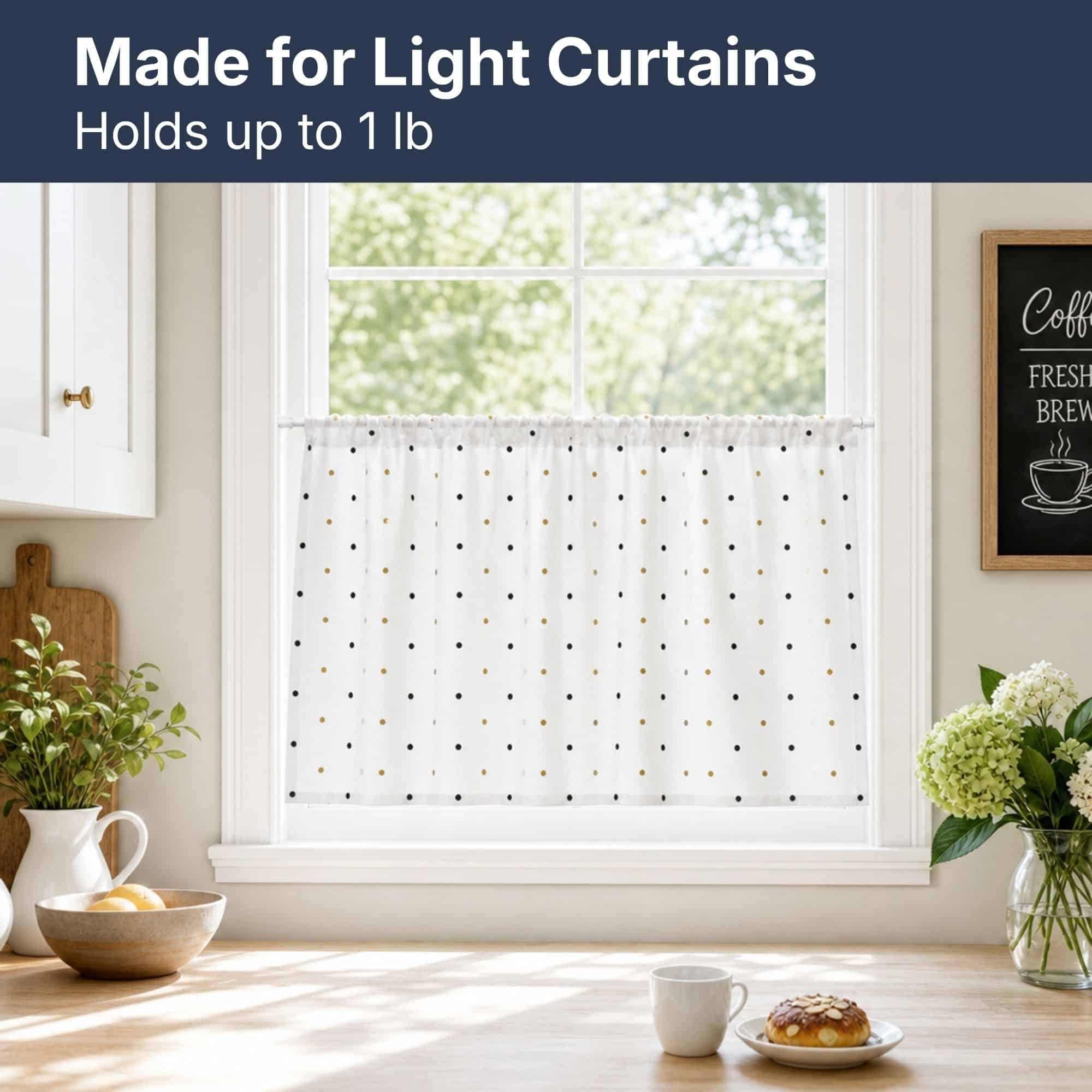 White cafe rod supporting a light polka dot tier curtain in a sunny kitchen, designed for lightweight curtains and holding up to one pound of fabric.
