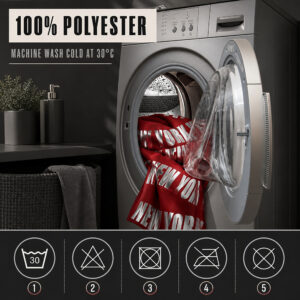 Red New York City polyester curtain in a washing machine with cold wash care symbols