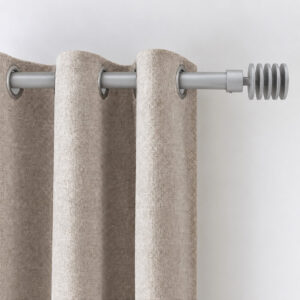 Ivory grommet drapery sliding on the matte grey 1 inch steel window rod, close-up