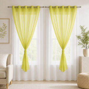 Sunlit room with the set of 2 lime green and white sheer curtains filtering daylight
