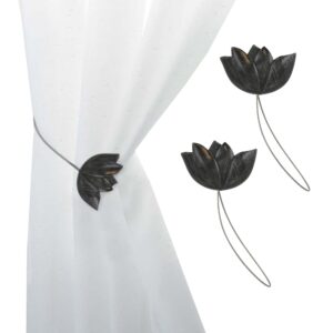 black resin tulip curtain tiebacks on white background