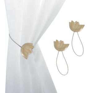 gold resin tulip curtain tiebacks on white background