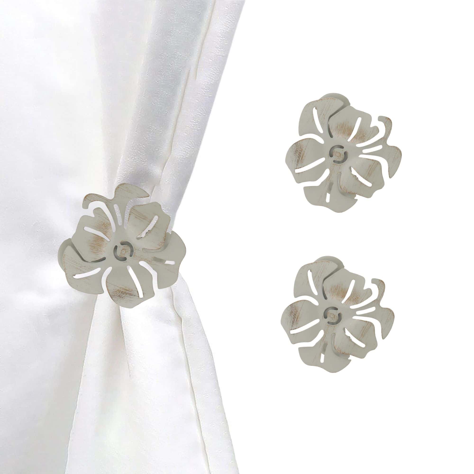 set of 2 metal flower clips for curtains in ivory on white background and on curtain