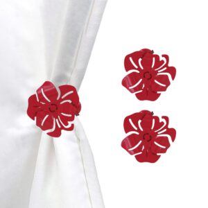 set of 2 metal flower clips for curtains in red on white background and on curtain