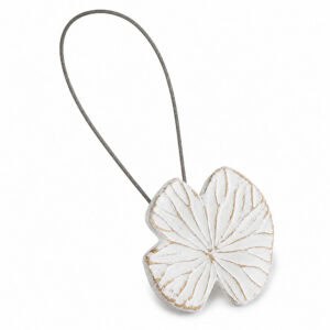 Hero: White whitewashed water lily leaf magnetic curtain tieback with gold-toned carved veins and a thin steel cable