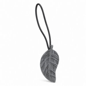 Single gray brushed wood-look leaf magnetic curtain tieback on a white background