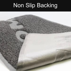 Non slip backing detail of gray semi circle PVC door mat