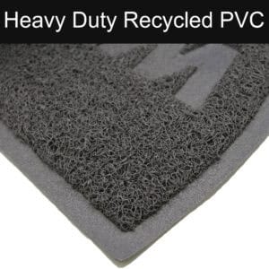 Close up of heavy duty recycled PVC texture on gray door mat
