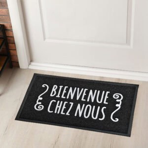Bienvenue Chez Nous indoor doormat in front of white entry door