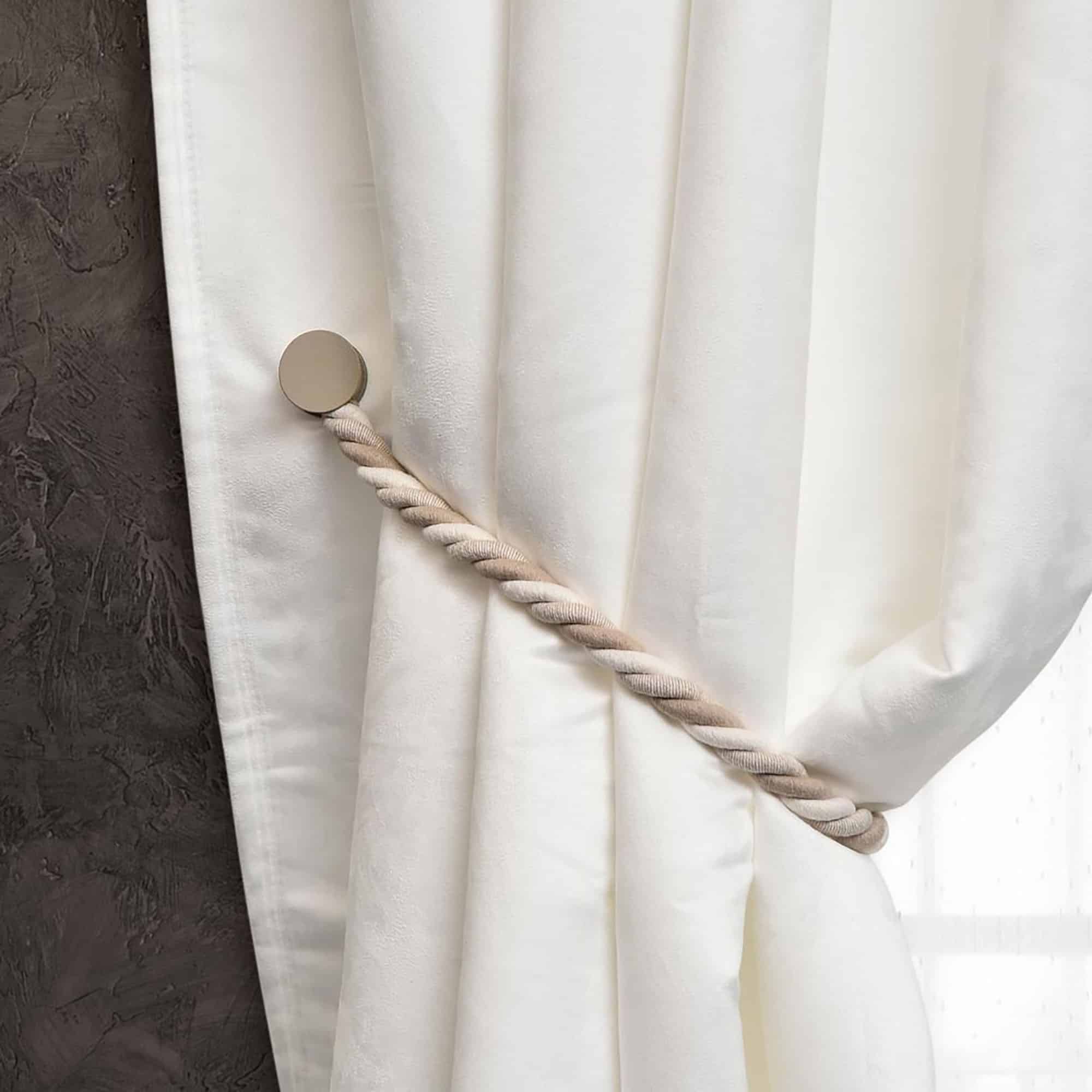 braided holdback on white curtain