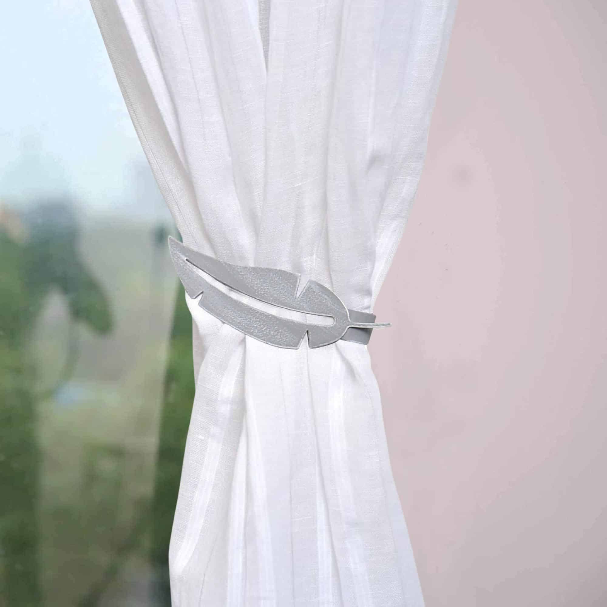 perspective of the curtain tieback on white curtain