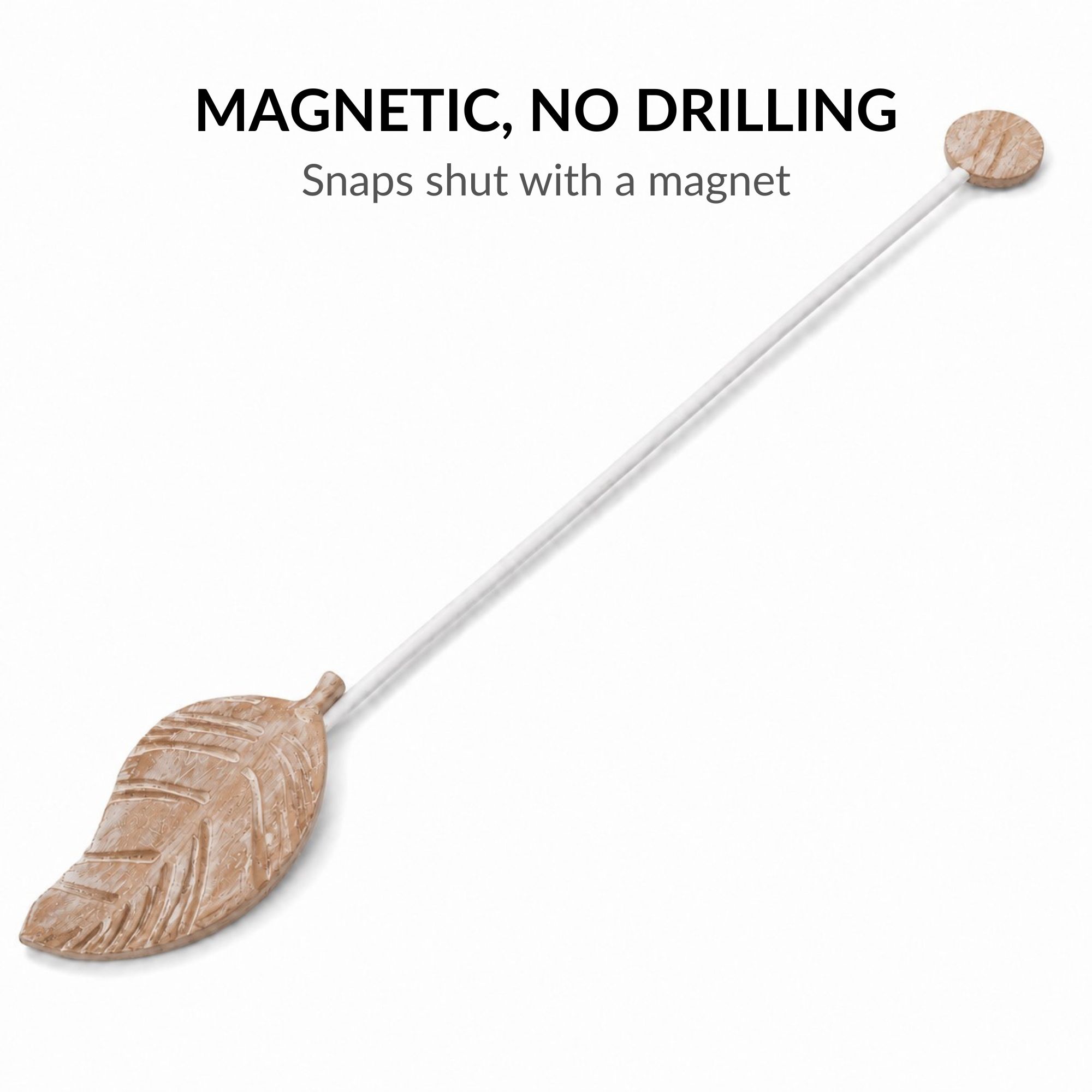 Natural wood leaf curtain tieback laid flat showing magnetic end-cap, no drilling