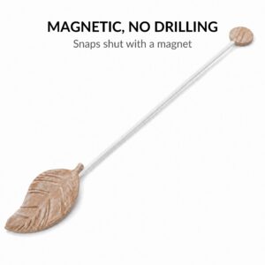 Natural wood leaf curtain tieback laid flat showing magnetic end-cap, no drilling