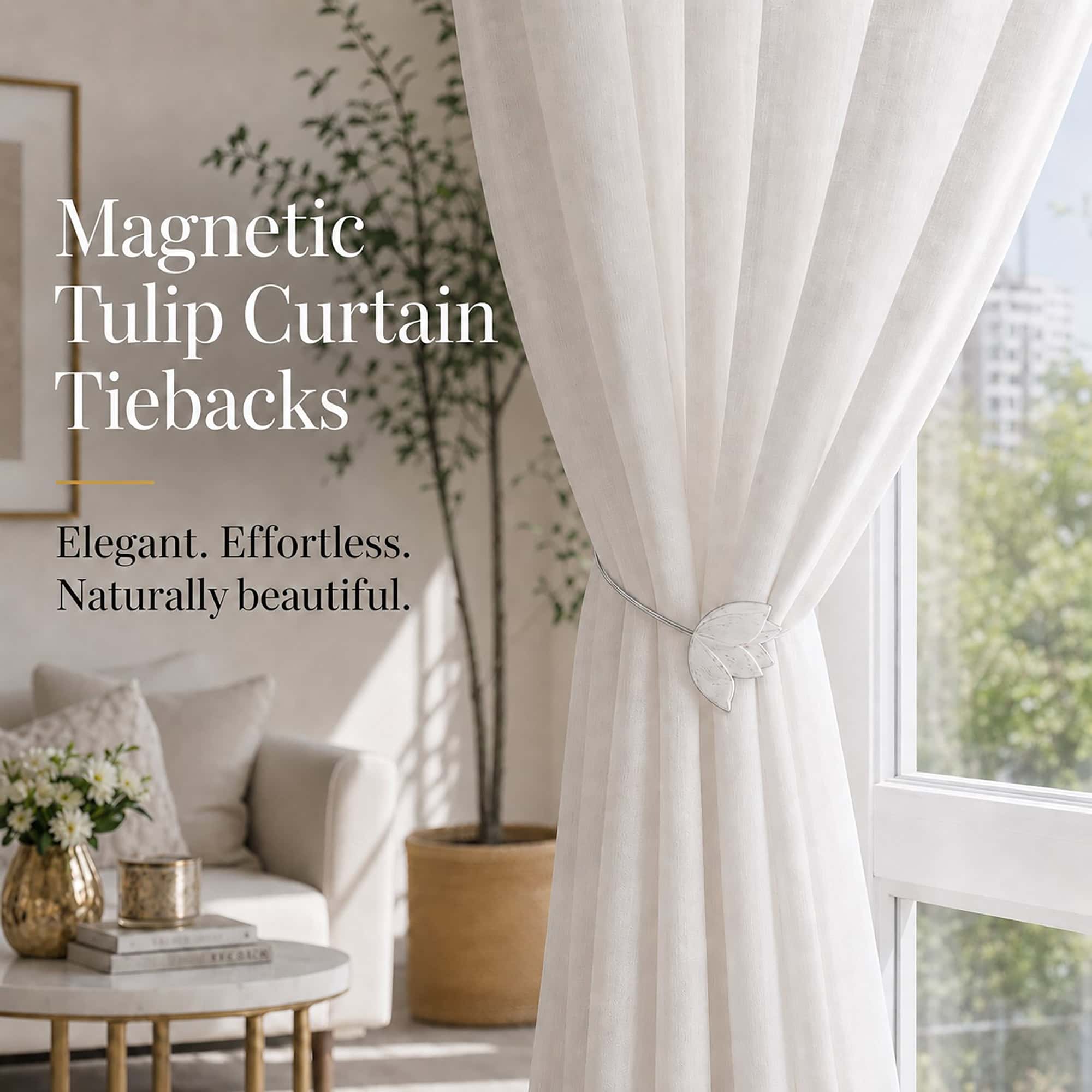 lifestyle: White resin tulip magnetic tieback holding a flowing sheer curtain beside a sunlit window in a bright neutral living room.
