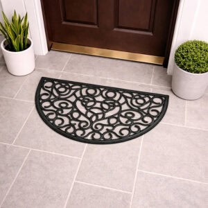 Angled view of semi circle rubber door mat on tiled entryway floor