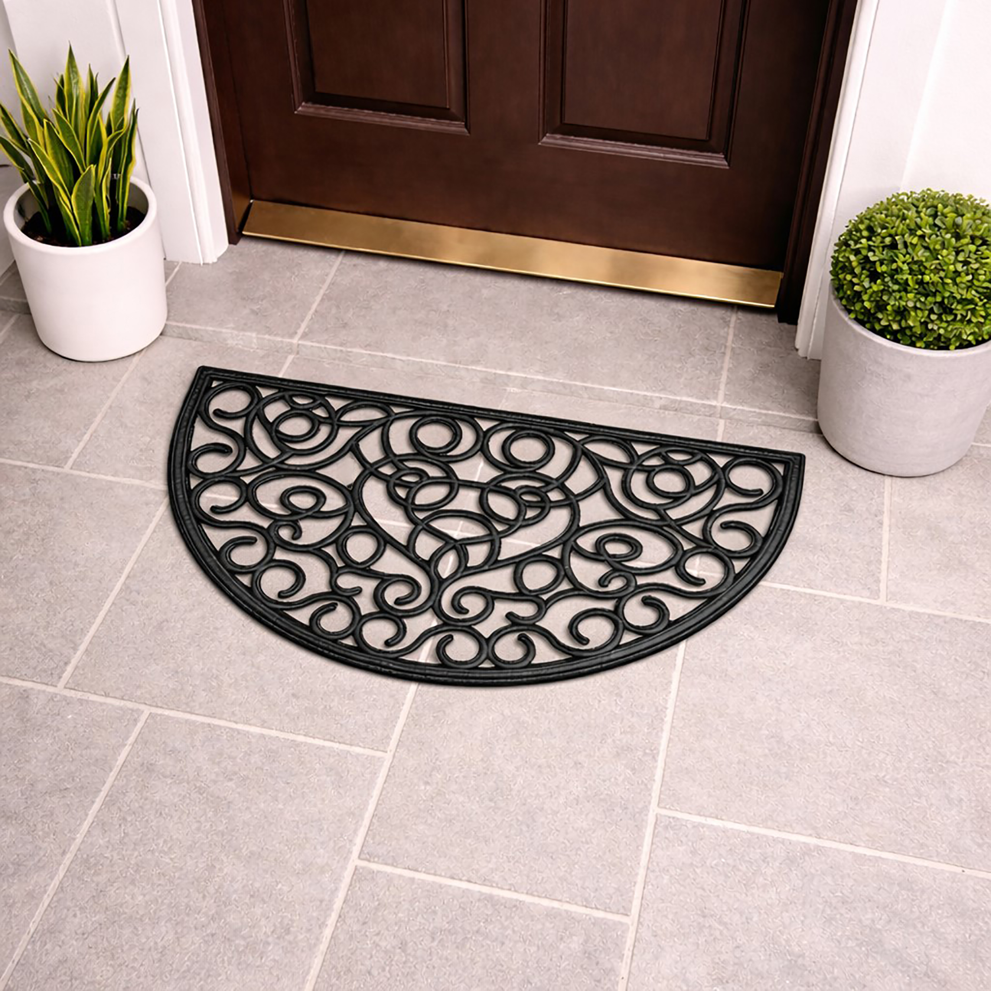 Angled view of semi circle rubber door mat on tiled entryway floor