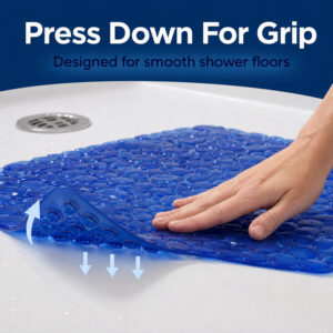 Hand pressing the grip pads onto a wet floor before use