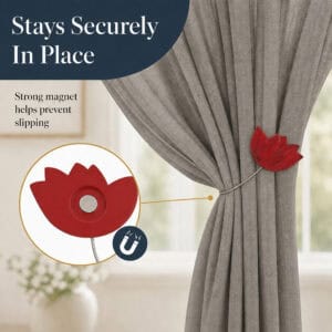 magnet hold: Close up of the red tulip tieback showing the hidden round magnet that grips the cable and helps prevent the curtain from slipping.