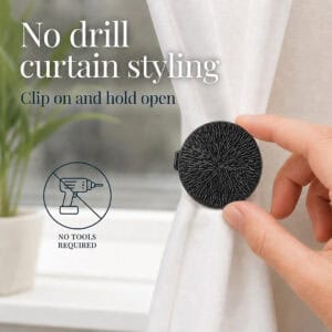 Pair of black round curtain tieback clips shown on one window, set of 2